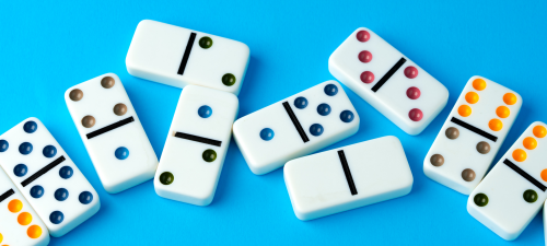Dominoes on a blue background.