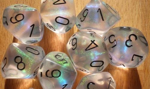 Several sparkly 0-9 dice.