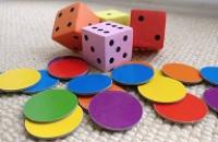 Dice and counters of varying colours.