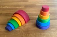 Stacks of circles and semi-circles of decreasing size.