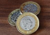 Three pound coins.