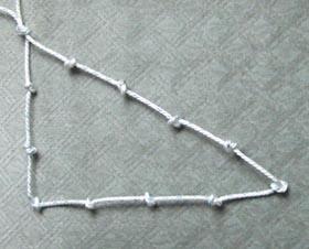 A right-angled triangle made of the same string, with side lengths 3, 4, and 5 units.