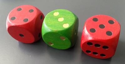 Two red dice and one green dice. The red dice are showing 4 and 5 and the green dice is showing 3.