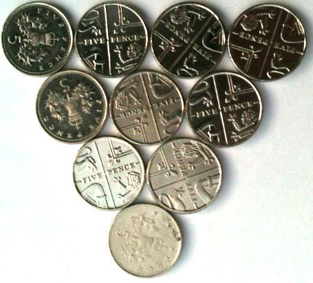 A triangle made of five pence pieces. The base is made of 4 coins, the next layer is made of 3 coins, the next layer is made of two coins, and the final layer is made of one coin.