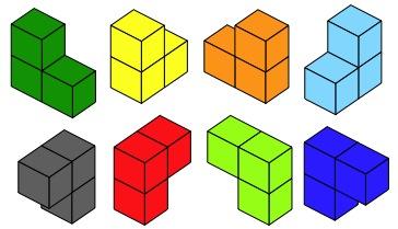 Various arrangements and colours of 3 cubes stuck together in an L-shape.