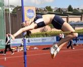 A woman doing a high jump.