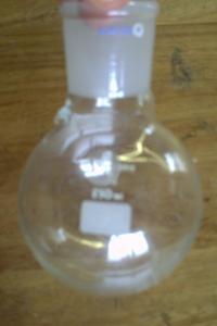 A flask with a large spherical bottom connected to a cylindrical neck of a slightly smaller length.