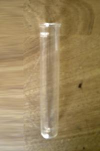 A cylindrical tube which has a very small volume, and a rounded bottom.