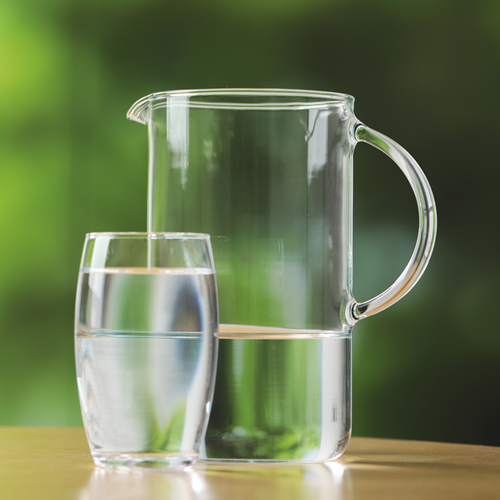 A jug and a glass of water.