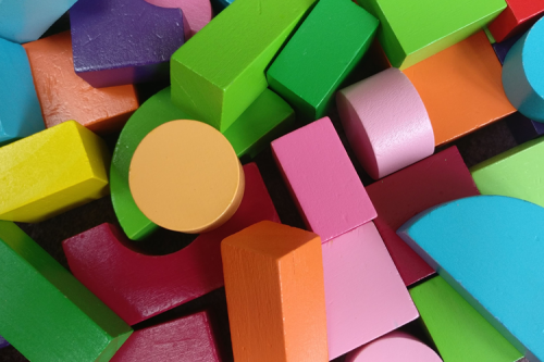 Wooden blocks of different colours and shapes.